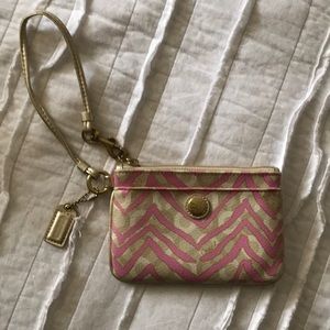 Coach pink and gold zebra wristlet